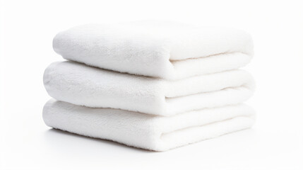 a stack of white towels on a white surface