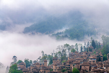 The cottage in the morning fog of Ailao Mountain, Yuanyang County, Honghe Prefecture, Yunnan Province, China.