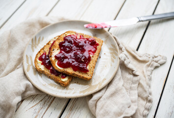 Whole Grain Toast with Cranberry Jam on Top