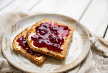 Whole Grain Toast with Cranberry Jam on Top