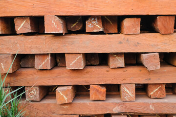 Skilled Hands at Work: Elegant Transformation of Ulin Wood into High-Quality Building Material