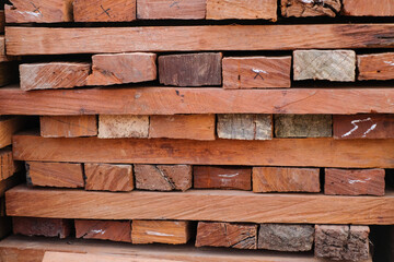 Skilled Hands at Work: Elegant Transformation of Ulin Wood into High-Quality Building Material