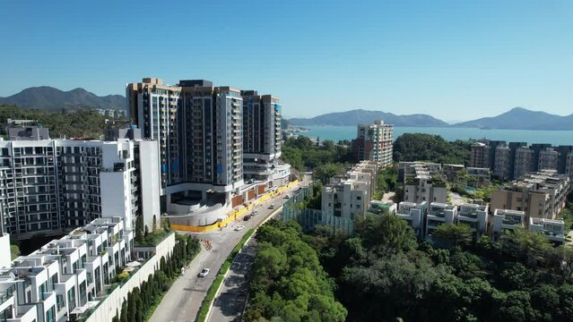 Aerial view of Hong Kong Gold Coast near Castle Peak Road, So Kwun Wat, Tuen Mun, New Territories, is an idyllic convenient seaside area includes a yacht club, country club, marina, shopping mall, and