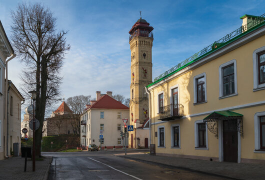 View of an old street in the historical center of the city and a fire tower in the background, Grodno, Belarus