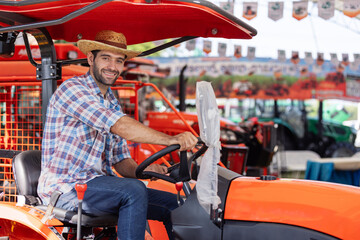 Farmers test drive tractors before deciding to buy them at agricultural fairs.The expo allows...