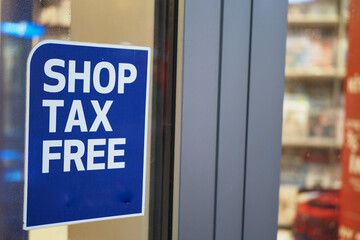 shop tax free text duty free shop sign on shop window  - obrazy, fototapety, plakaty