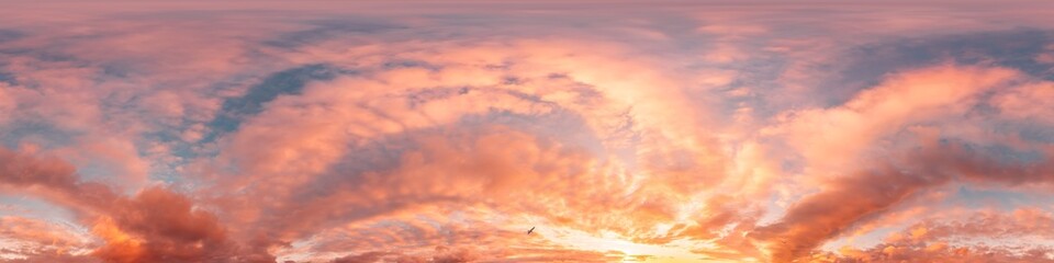 Sunset sky panorama with bright glowing pink Cirrus clouds. HDR 360 seamless spherical panorama. Full zenith or sky dome in 3D, sky replacement for aerial drone panoramas. Climate and weather change.