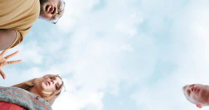 Support, outdoor or friends with fist bump in huddle for teamwork, motivation or solidarity together. Sky, low angle or hands of people in group or happy celebration for goals, target or fun mission