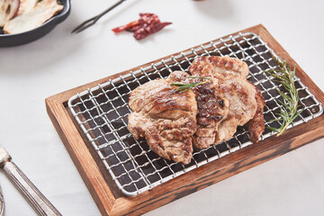 Deliciously cooked pork front legs on a white background