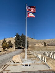 American Flag and Gold Star Service Flag Waving in the Wind at Armed Forces Cemetery