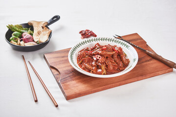 Spicy and delicious seasoned pork tripe on a plate