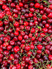Cherry in supermarket, season of summer berries and fruits, cherries in the market, antioxidant...
