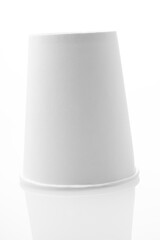 White cardboard cups on white background, blank for mockup design
