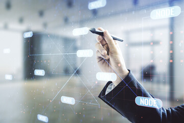 Double exposure of male hand with pen working with abstract programming language interface on blurred office background, research and development concept