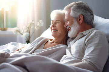 You are the beautiful part of my life. Happy elderly couple cuddling in bed. Romantic feelings. Love.