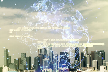 Double exposure of abstract programming language hologram and world map on Los Angeles city...