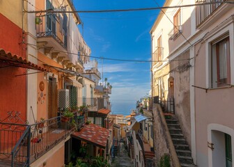 Fototapeta na wymiar view of a narrow village street in Pizzo Calabro in typical Italian shabby chic style