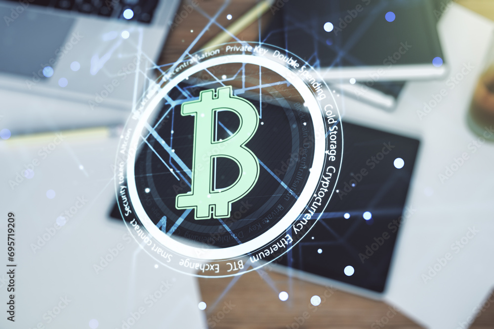 Poster Creative Bitcoin concept and modern digital tablet on desktop on background, top view. Double exposure