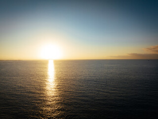 Obraz premium Aerial view of beautiful sea wave and sunrise sky