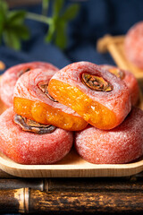 close up of dried persimmon on wooden table.