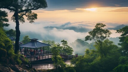 Rainy season is one of the most favorite travelling season .Tourist can enjoy scenic view full of fresh air, greenery and beautiful sea of fog on mountain top make it unforgettable. - obrazy, fototapety, plakaty