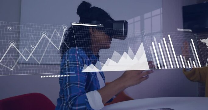 Animation of data processing over biracial businesswoman using vr headset
