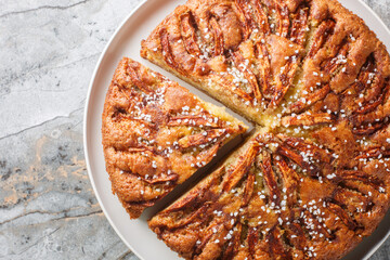 Norwegian Apple Cake Eplekake is a soft buttery cake filled with cinnamon sugar apples close-up on...