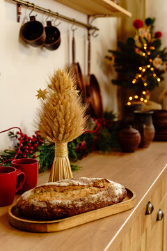 Traditions of celebrating Ukrainian Christmas. Ukrainian food. Bread is the head of everything