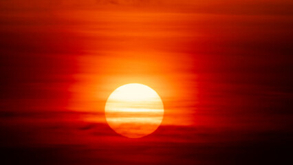 Beautiful nature morning with orange, yellow sunshine and fluffy clouds. Beautiful colorful dramatic sky with clouds at sunset or sunrise.