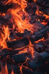 A close-up view of a pile of wood with a fire burning. This image can be used to depict warmth, coziness, or the concept of a campfire