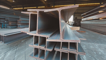 Metal forming steel beams at the metal products warehouse, H-beam steel and Wi-Frank steel. For...