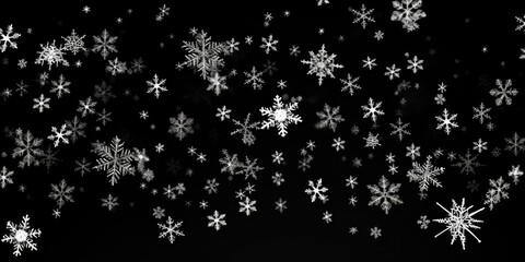 Snowflakes gracefully floating through the air. Perfect for winter-themed designs and holiday projects