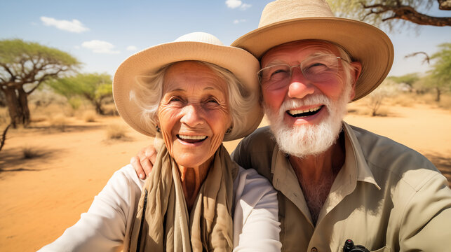Retired couple on a Safari in Africa. Senior man and a woman on adventure in the desert.