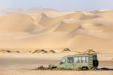 4x4 car stuck in the sand of Namib desert, Namibia, Africa - 695785845