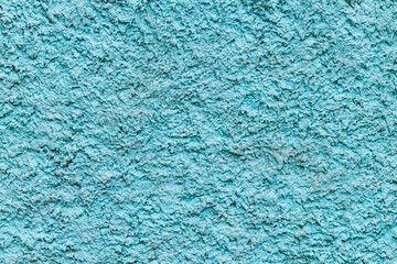 Fototapeta na wymiar background of a wall covered with blue plaster