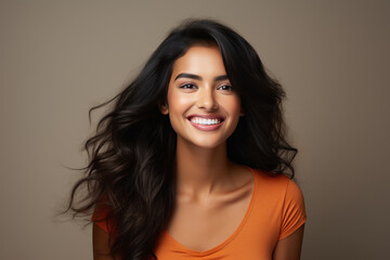 Fototapeta premium Young and beautiful indian woman smiling on white background.
