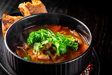 Shurpa soup with lamb meat in bowl