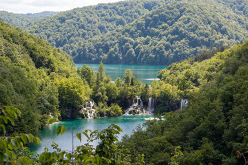Fototapeta na wymiar andscape waterfalls cascades in the Plitvice Lakes National Park (Nacionalni park Plitvička jezera) in the state of Gospić in Croatia 