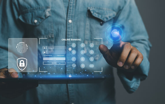 SHORTLISTbanking.Businessman using tablet and fingerprint scanning unlock and access to business data network. Biometric identification and cyber security protect business transaction from online.