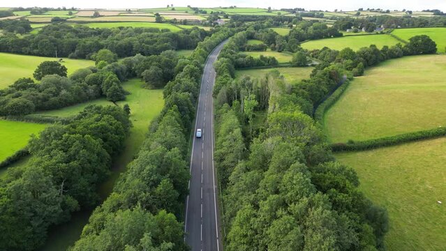 Aerial view of a road in the countryside in Wales, United Kingdom