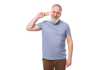 a positive and full of energy old man with a white mustache and beard is dressed in a basic t-shirt and trousers