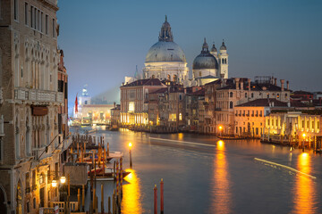 Venice, Italy: panorama of the Grand Canal and Punta della Dogana with late afternoon light - 695805460