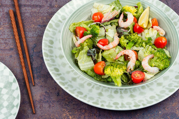 Salad with broccoli and shrimp, Asian food.