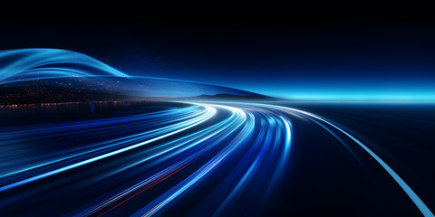 Light trails on the road at night. Concept of speed and motion