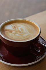 cup of coffee on wooden table