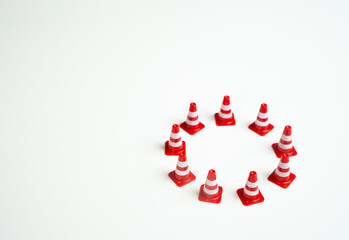 Circle of traffic cones. Localize the danger. Safety. Life and health insurance. Protection of property and business. Reliable data security system. Internet and network technologies.