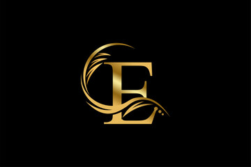 Gold letter E logo design with beautiful leaf, flower and feather ornaments. initial letter E. monogram E flourish. suitable for logos for boutiques, businesses, companies, beauty, offices, spas, etc