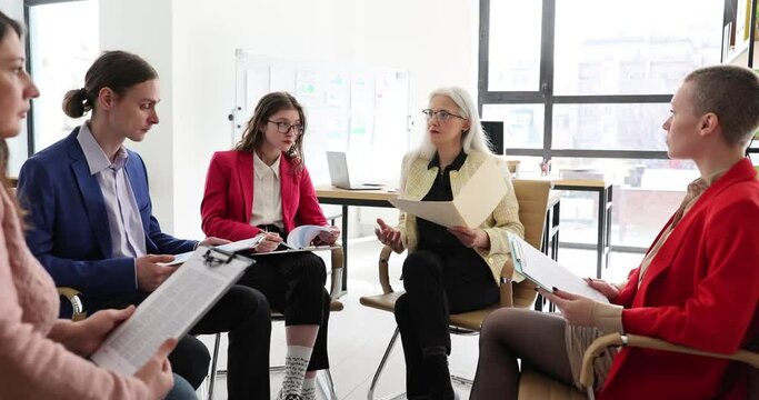 Business group is negotiating marketing reports, talking discussing strategy of startup project brainstorming. HR team interviewing job candidate