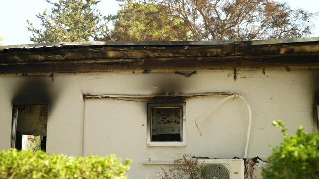 Home in Kibbutz Be'eri was attacked on October 7th, remnants of the house are burned, windows are scorched. House left overs attacked.