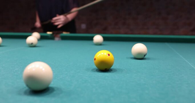 Sports game of billiards on blue cloth. Billiard balls with numbers on pool table